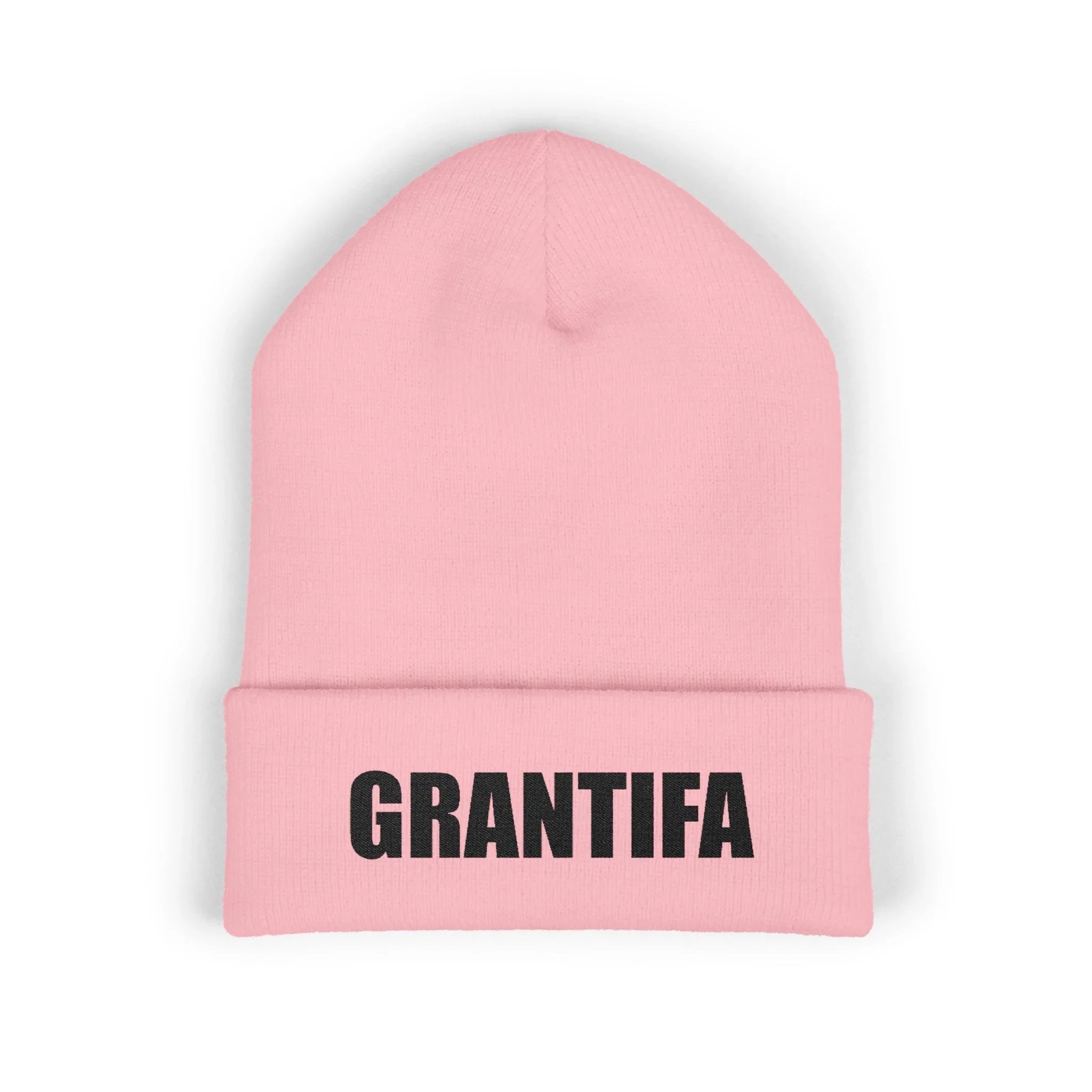 Pink protest beanie hat with bold black GRANTIFA text, activism statement winter apparel