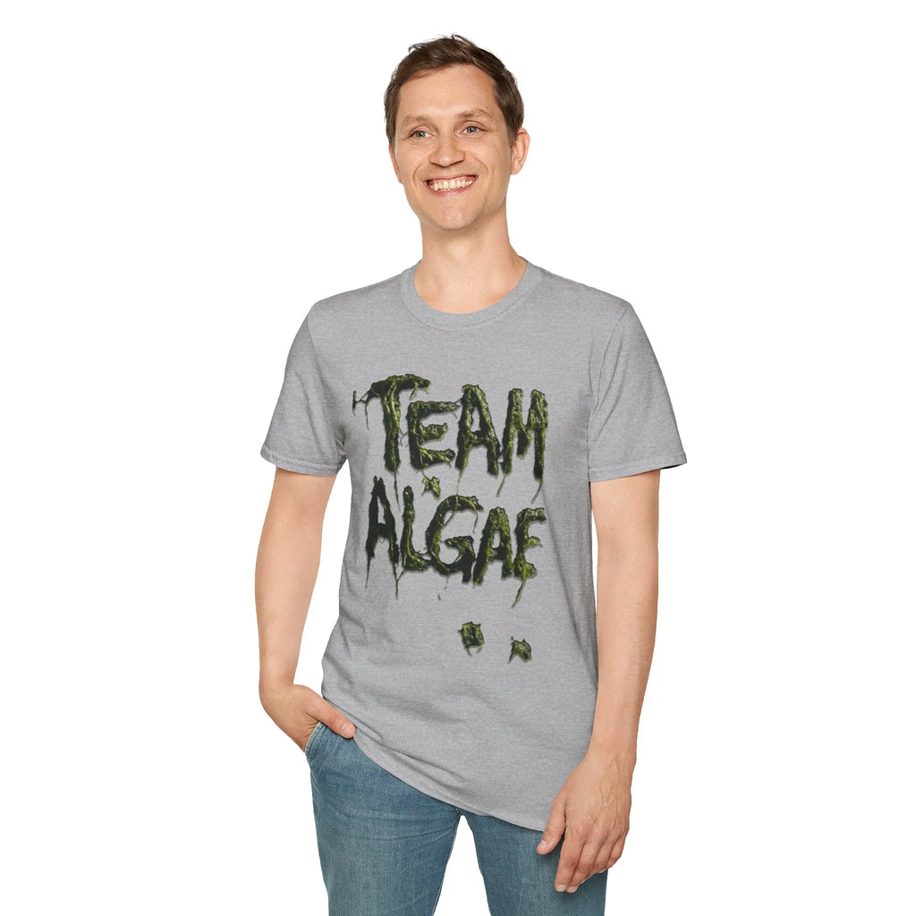 Man wearing gray 'Team Algae' protest tee with green slime graphic, unique artist-designed activism apparel