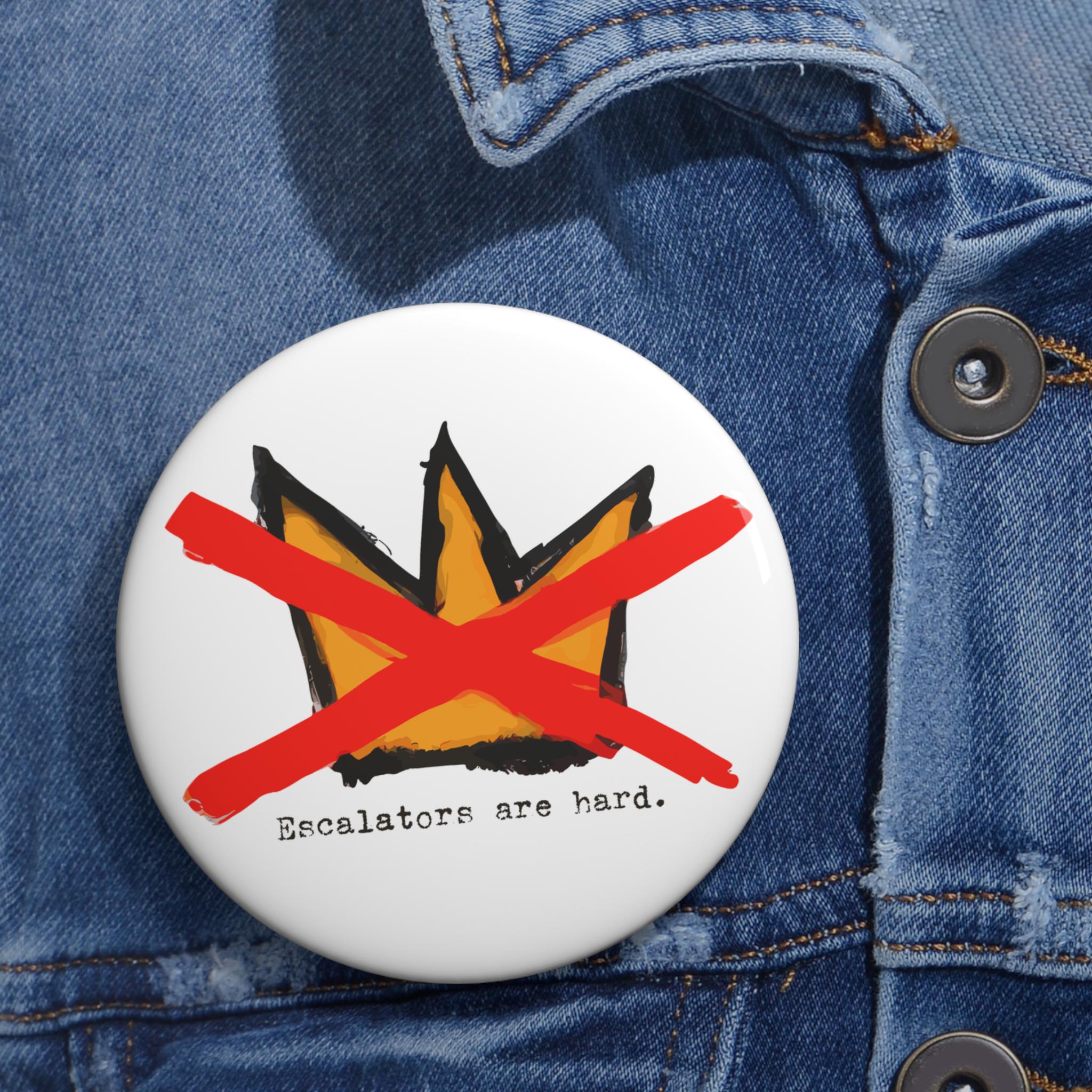 No Kings UN escalator Pin makes fun of Trump – "Escalators Are Hard" Protest Button